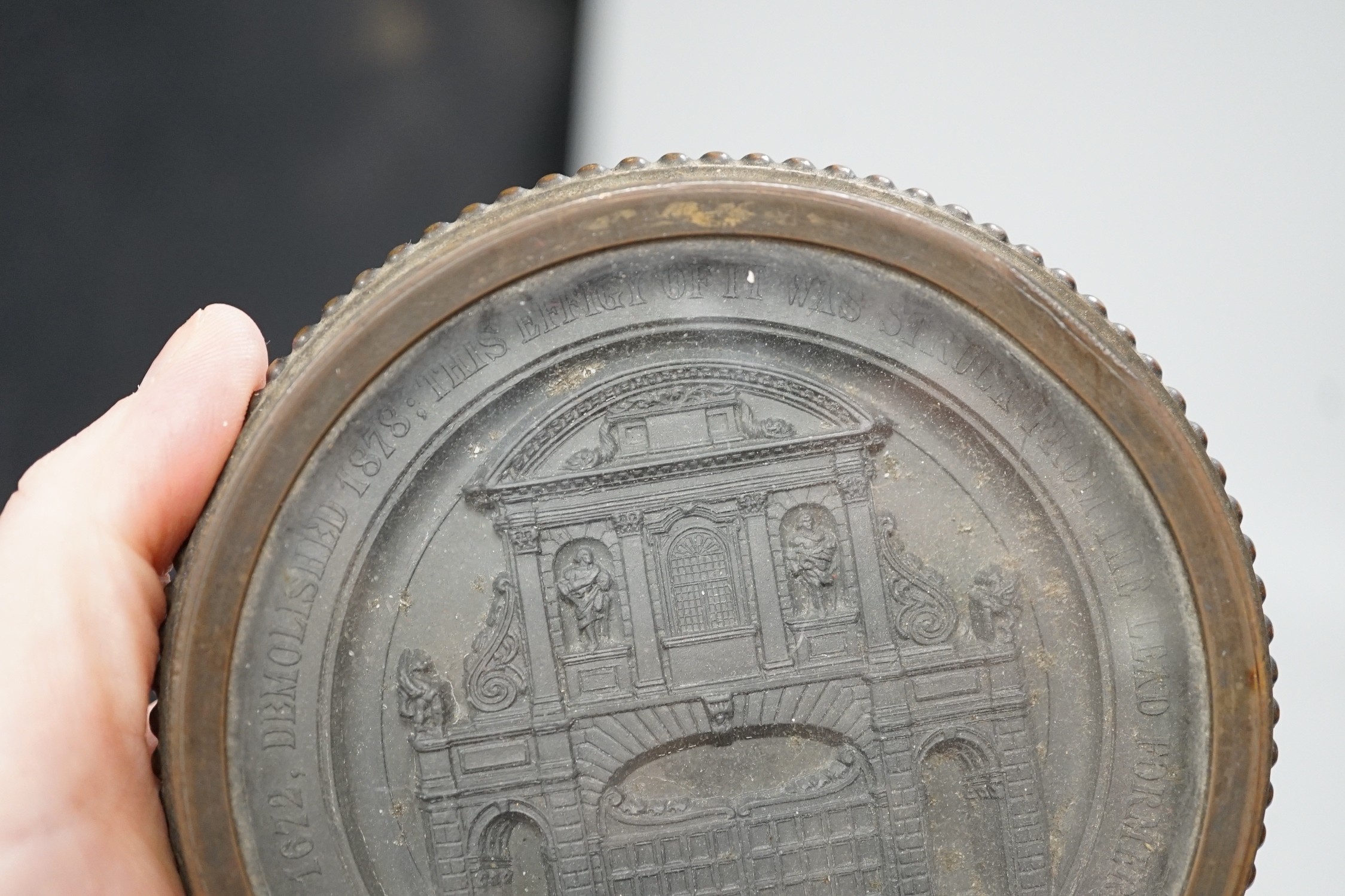 Temple Bar commemorative cast lead and brass paperweight, ‘Temple Bar: erected 1672, demolished 1878; this effigy of it was struck from the lead formally on the roof’ and a 19th century gilt metal relief glass cased pape